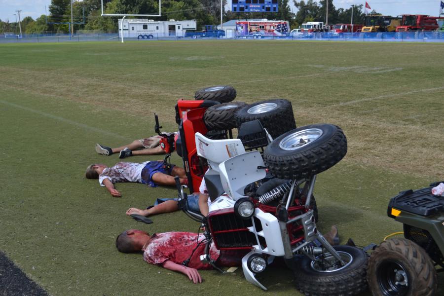 ACCIDENT SIMULATION-- GC drama students play victims of a fatal ATV accident at Wednesdays Ag Safety Day culminating assembly, held at Eagle Stadium.