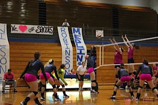 Chaney Inman returns the volley to the Bombers.