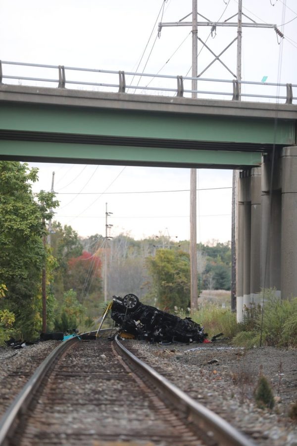 Porsche went off overpass onto train tracks near West Crooked Hill Road. (Photo courtesy of USA Today News)