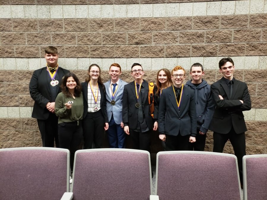 (from left) Michael Black, 3rd place, Impromptu Speaking, 5th place, Original Oratory, 5th place, Poetry; Mina Cakilkaya, 7th place, Humorous Interpretation; Olivia Gregory, 6th place, Storytelling; Kendall Tubbs, 6th place, Extemporaneous Speaking; Aidan Walker, 2nd place, Storytelling; Carrie Cavitt, 4th place, Storytelling; Nick Lashbrook, 7th place, Extemporaneous Speaking, 4th place, Humorous Interpretation; Landon Ray; John Roberts.