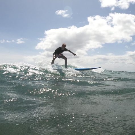 Ian Hart learning to surf during professional lessons