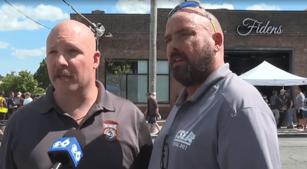 People gather at a fundraiser in Albany to support two injured first responders