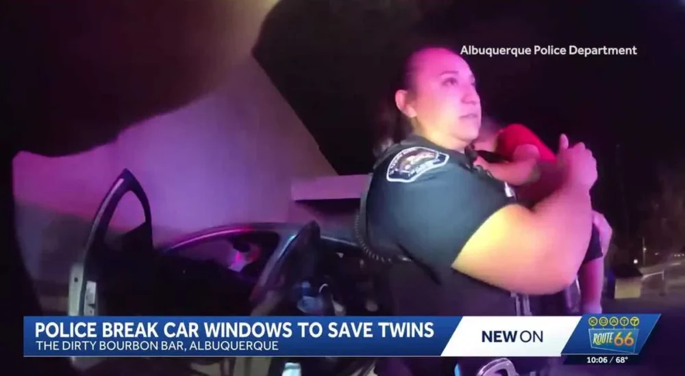 Albuquerque police officers rescue two toddlers from a locked car outside a bar