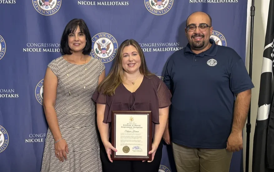 Nicole Malliotakis presents a Congressional Commendation to Stefanie Homan on Staten Island